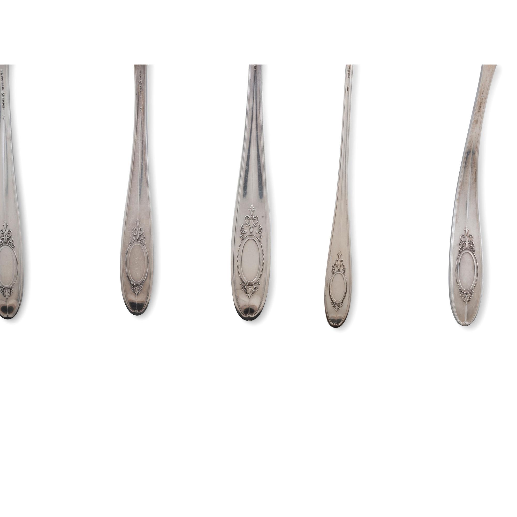 An International Silver Flatware Service in Custom Case