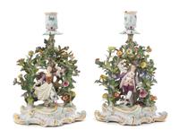 A Pair of Meissen Bocage Porcelain Figural Candlesticks Height 9 inches. — 19TH CENTURY
