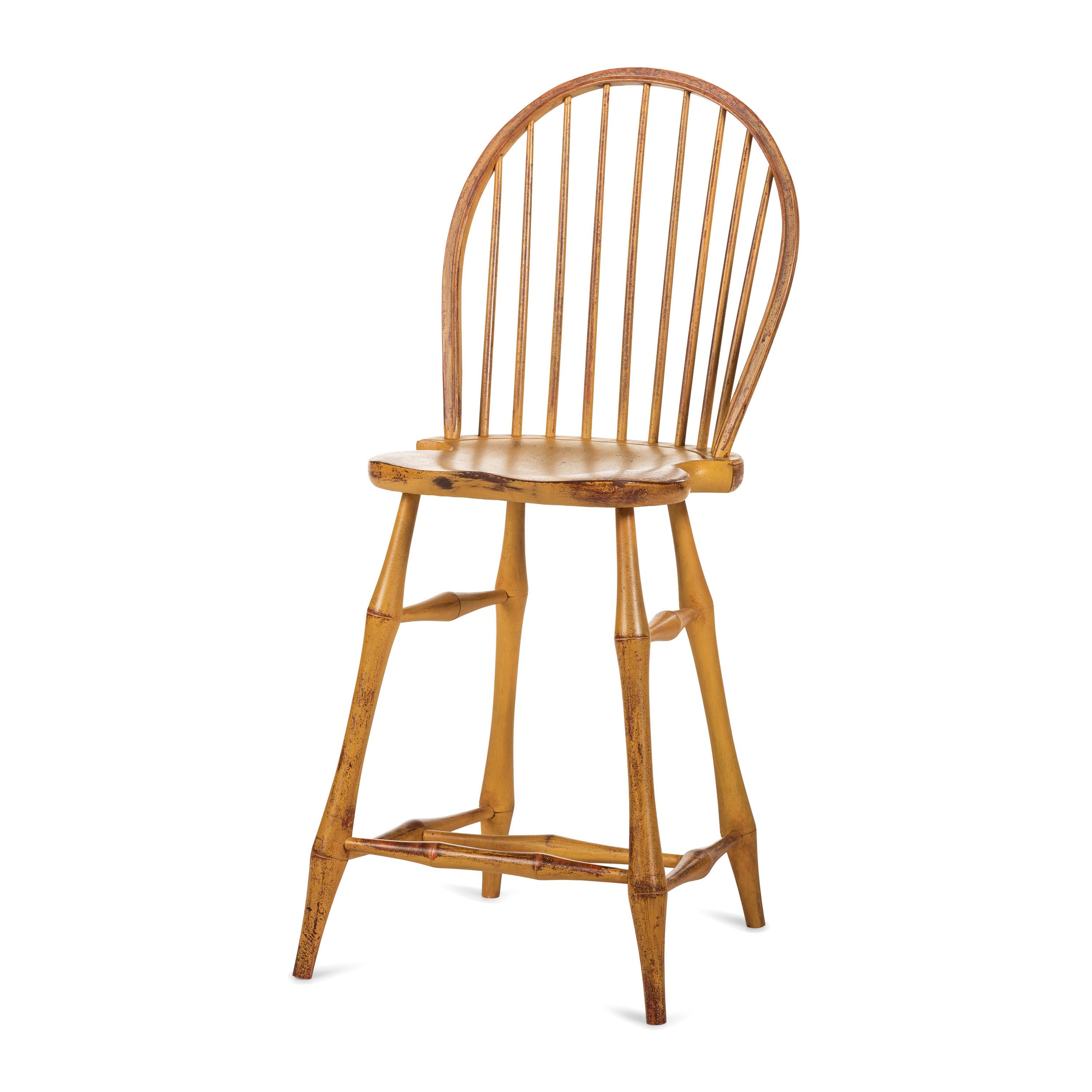 A Yellow Painted Bow Back Compass-Seat Windsor Tall Chair