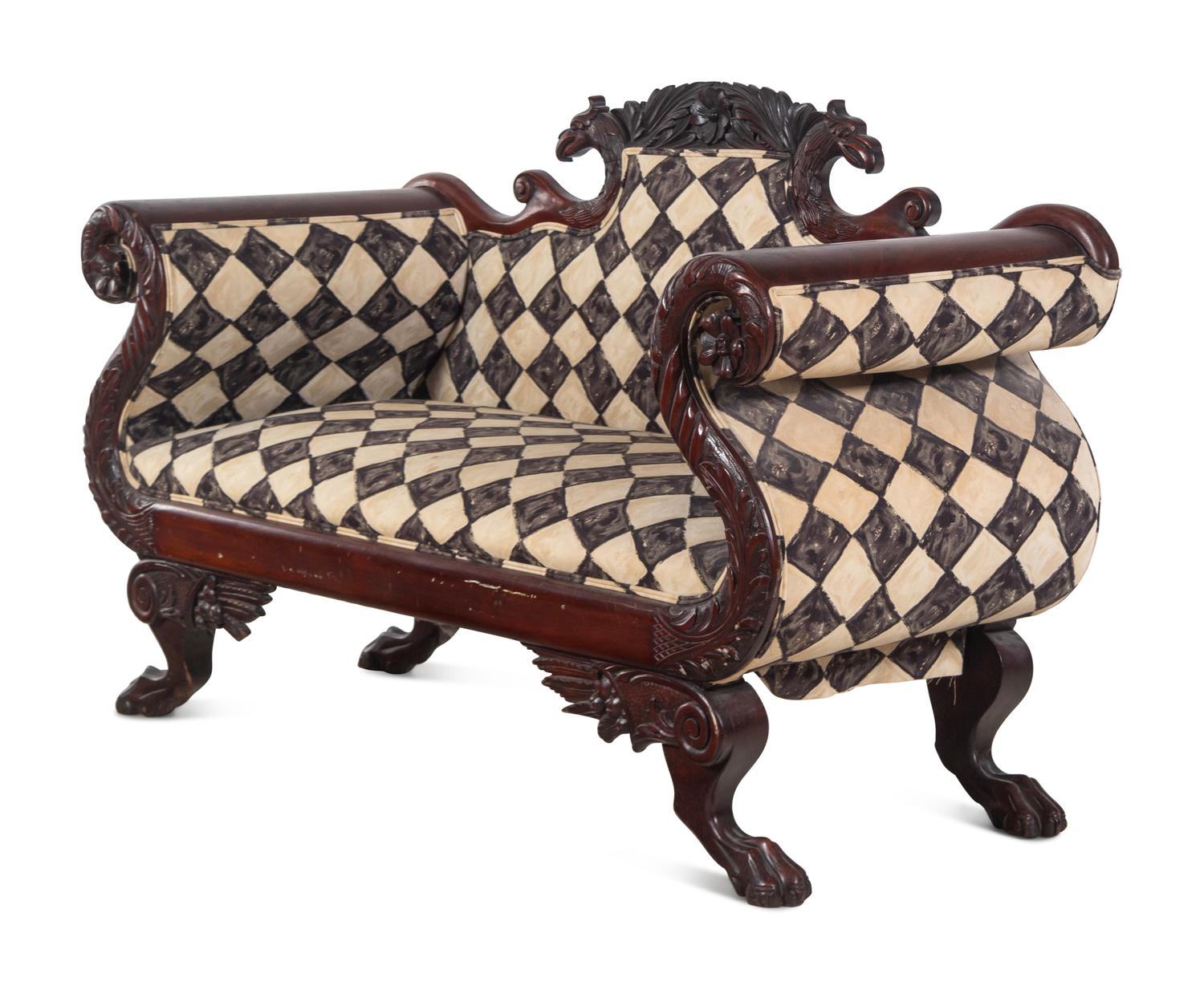A Classical Carved and Figured Mahogany Settee