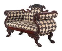 A Classical Carved and Figured Mahogany Settee