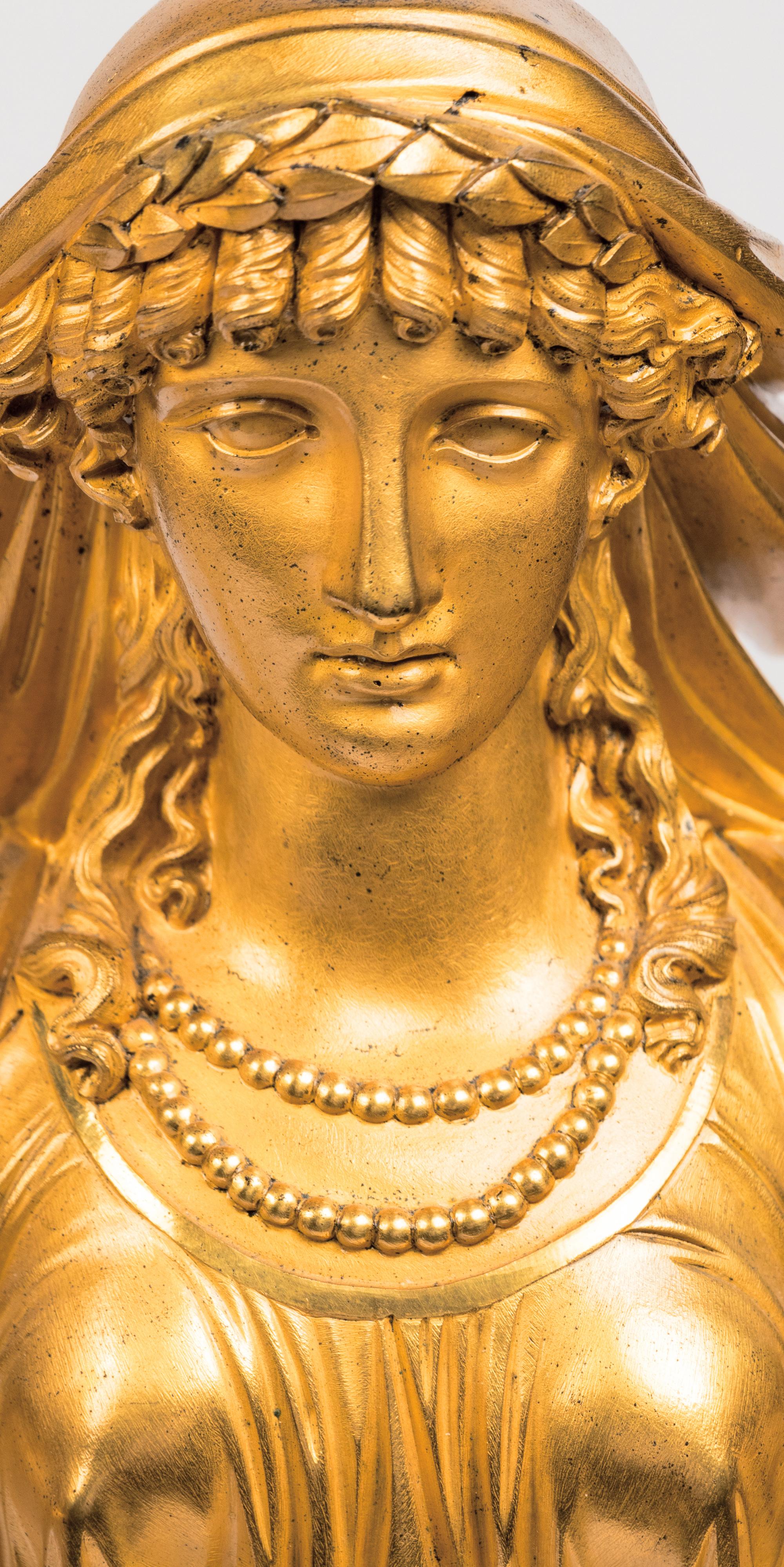 A Pair of Restauration Ormolu and Marble Figural Candelabra