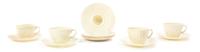 A Belleek Porcelain Tea Service for Four, Width of first over handle 10 3/4 inches.