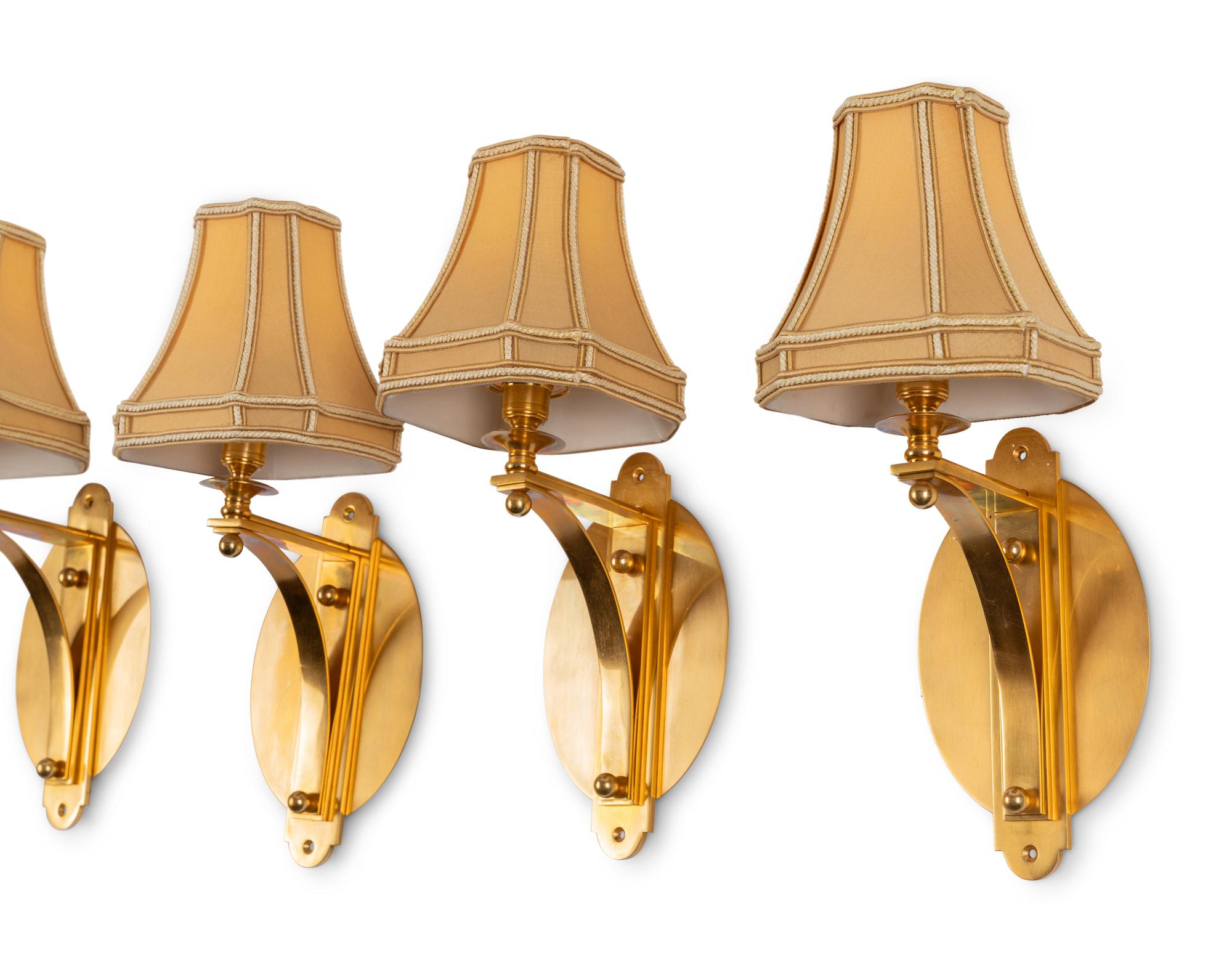 A Set of Ten Brass Single-Light Sconces with Custom Shades