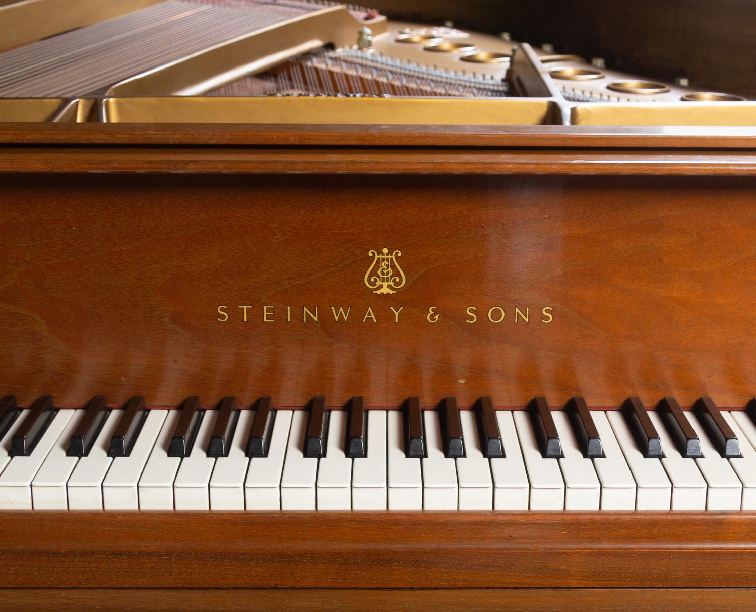 A Steinway and Sons Model M Grand Piano