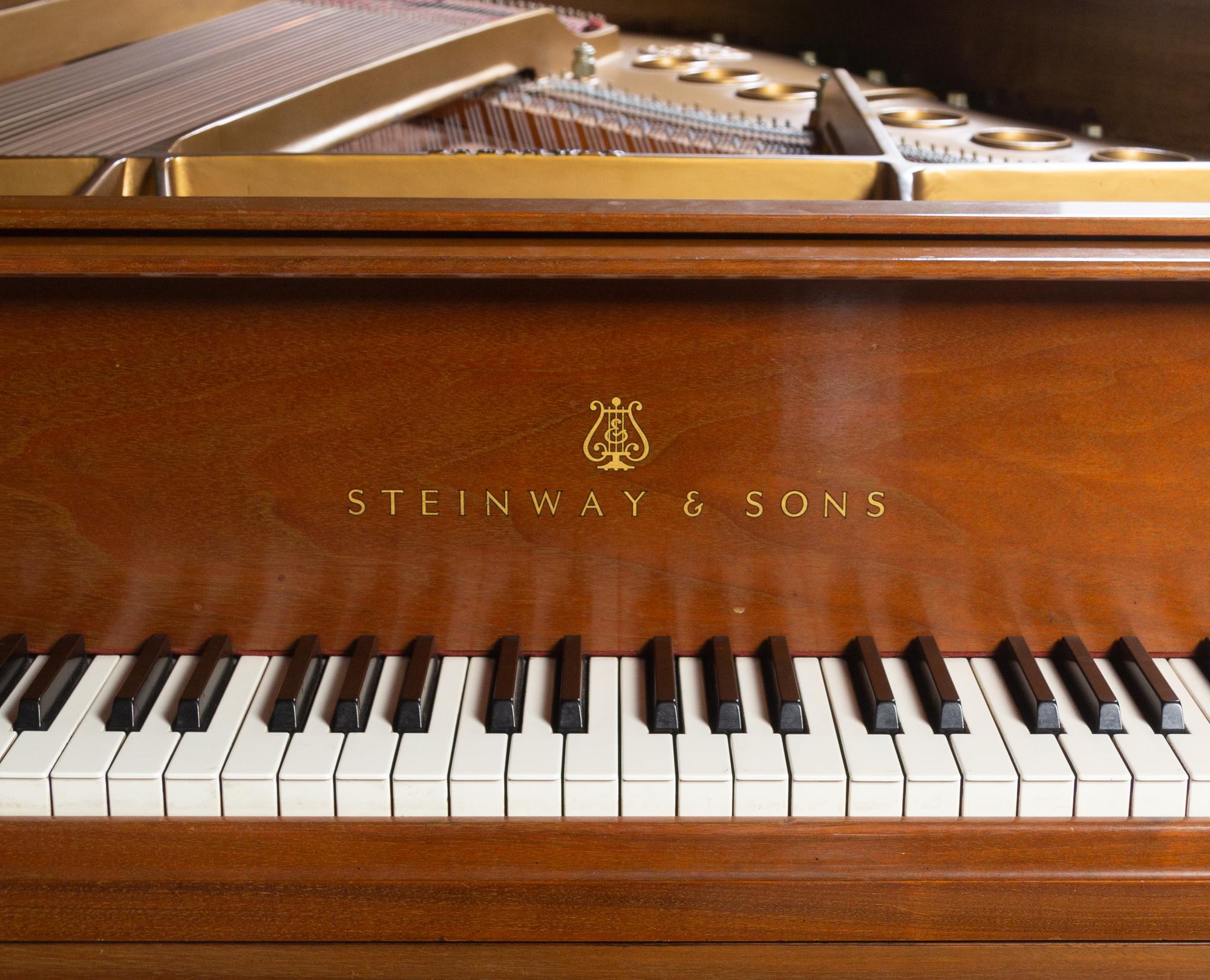 A Steinway and Sons Model M Grand Piano