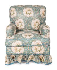An English Chintz-Upholstered Easy Chair and Ottoman