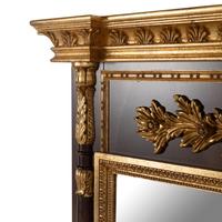 A Neoclassical Style Parcel-Gilt Walnut Mirror