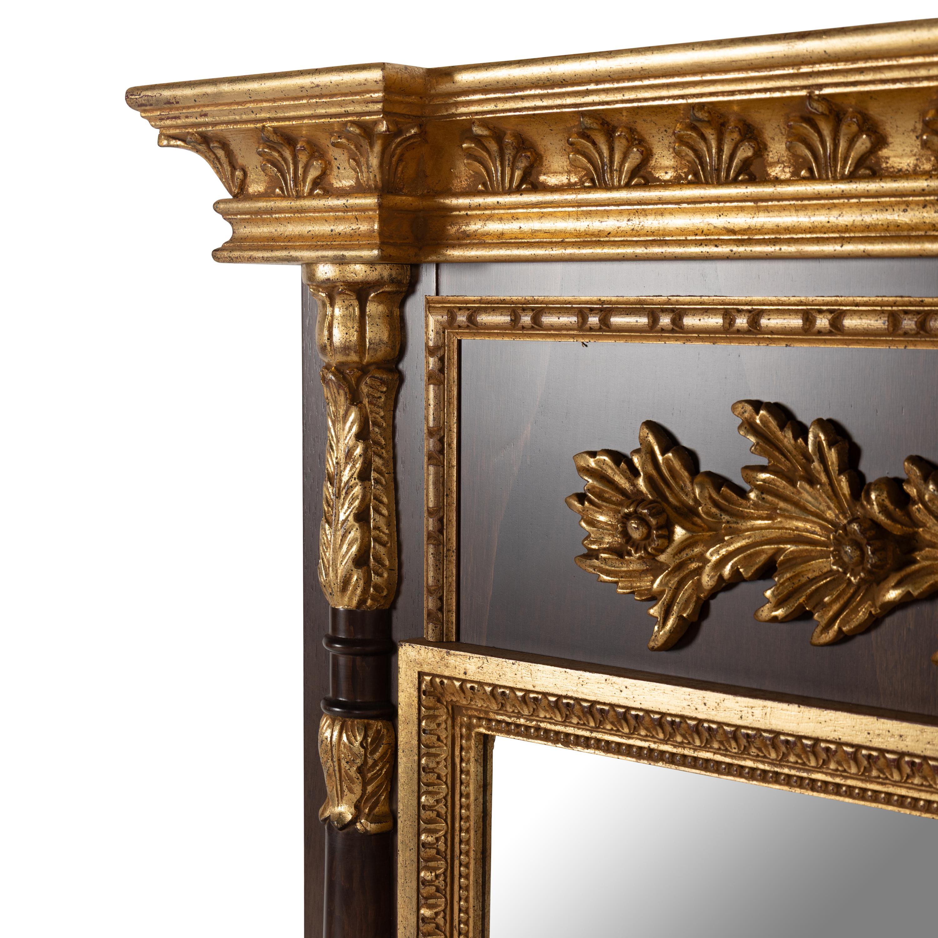 A Neoclassical Style Parcel-Gilt Walnut Mirror