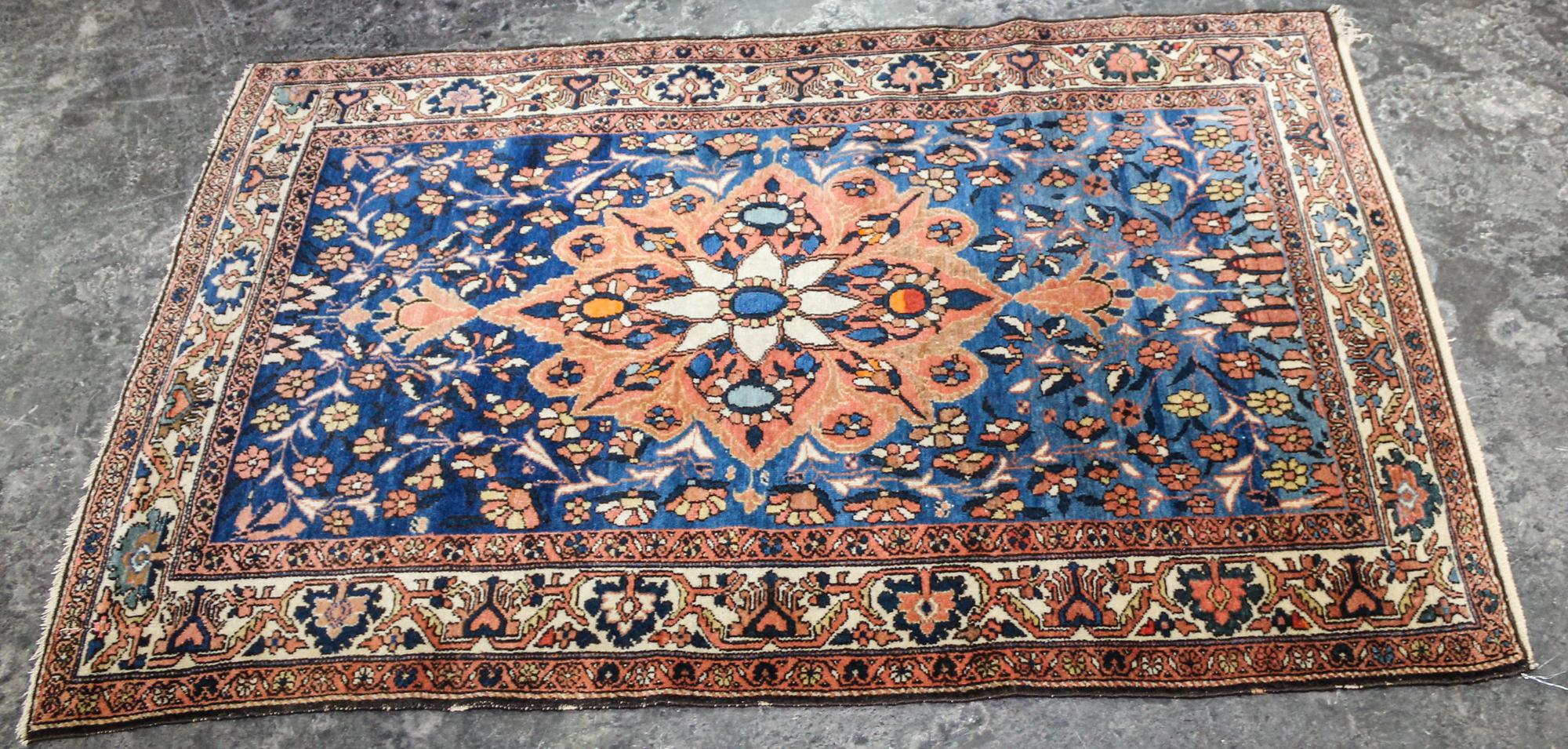 A Northwest Persian Wool Rug 4 feet 11 inches x 3 feet 3 inches. — EARLY TO MID 20TH CENTURY