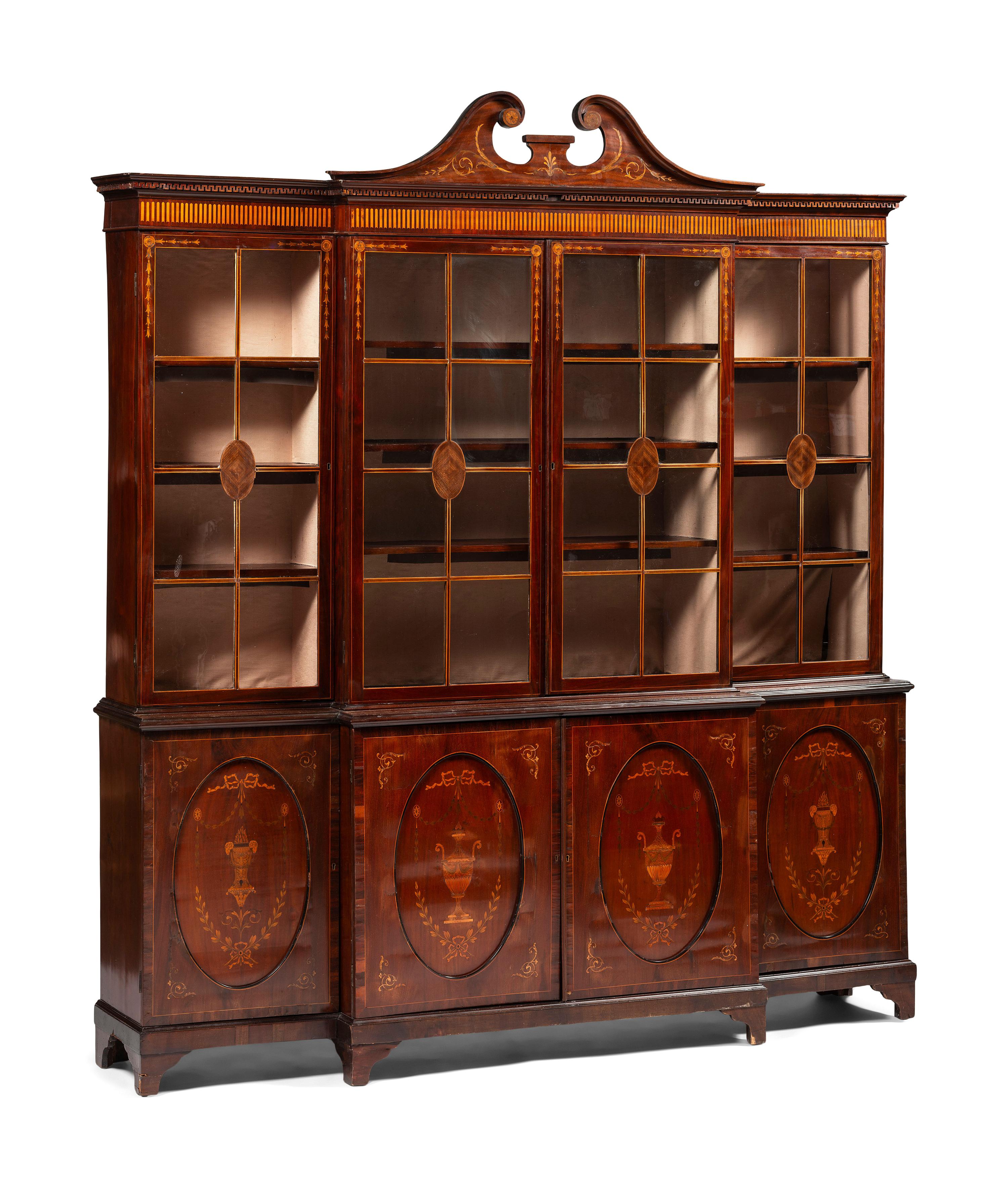An English Mahogany and Marquetry Breakfront Bookcase