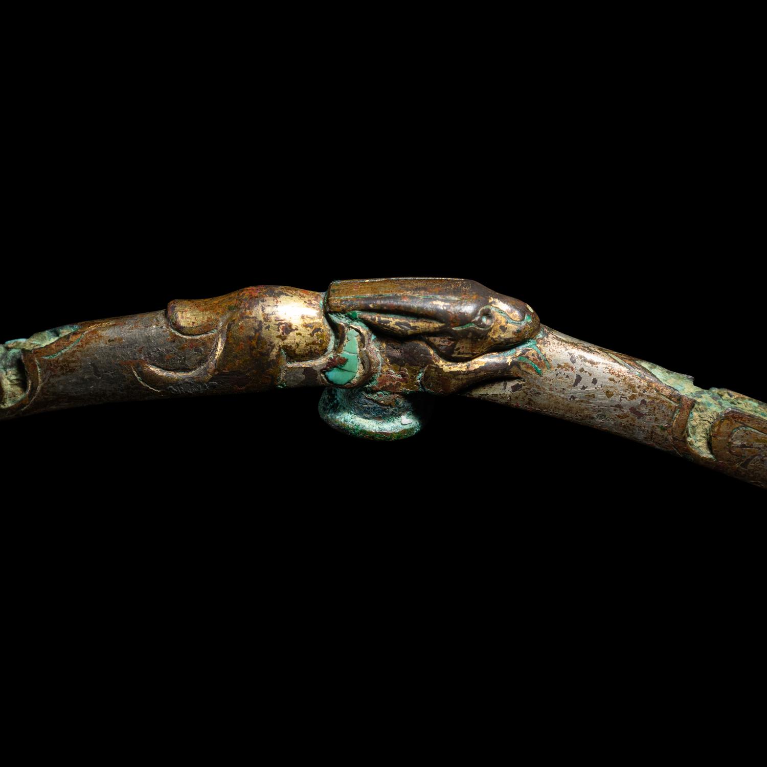 A Chinese Gilt, Silvered and Turquoise Inlaid 'Rabbit' Gold Belt Hook, Warring States Period 戰國 鎏金銅錯銀嵌松石雙獸首奔兔帶鉤