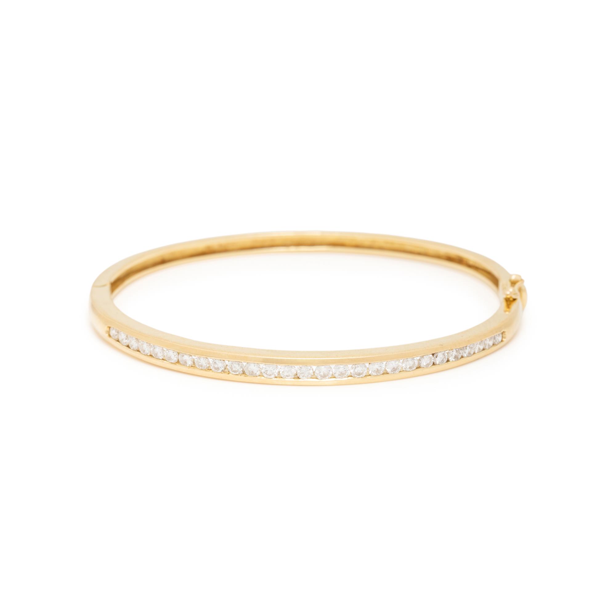 CRAIG DRAKE, DIAMOND AND YELLOW GOLD BANGLE BRACELET