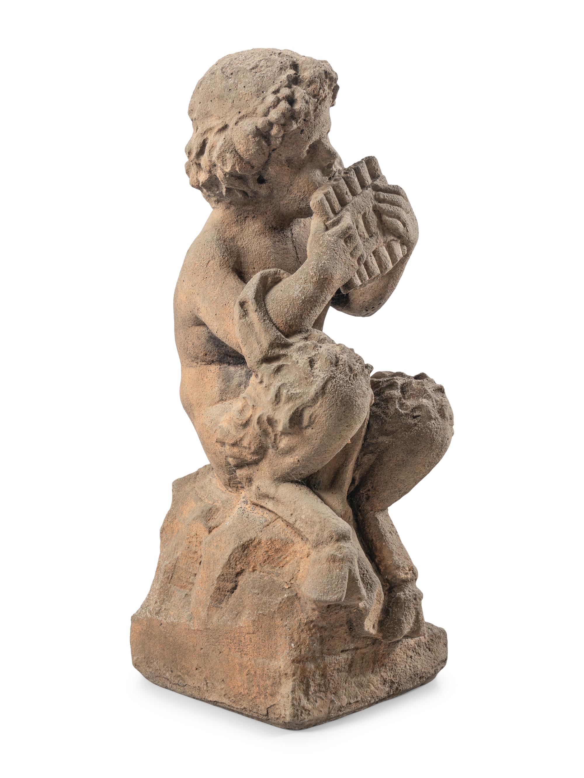 A Carved Limestone Figure of Pan