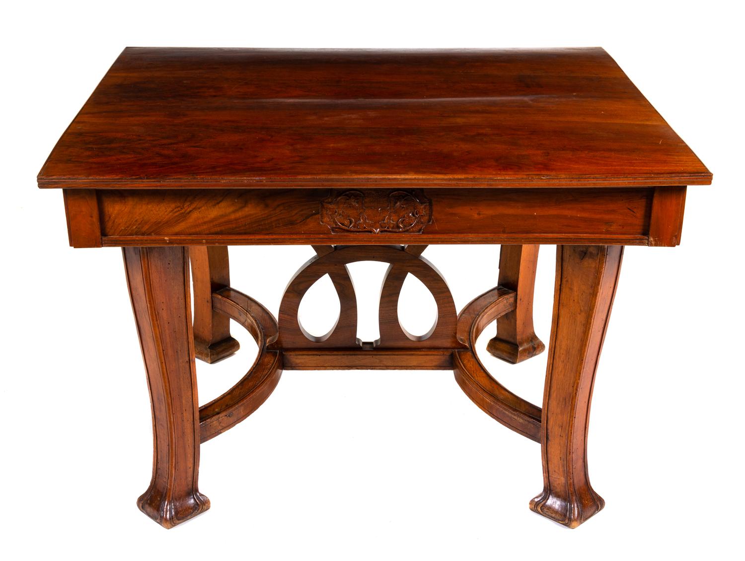 An Italian Art Nouveau Style Walnut Dining Suite Height of table 31 1/2 x width 47 1/2 (closed) x depth 40 1/4 inches. — 20TH CENTURY