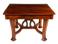 An Italian Art Nouveau Style Walnut Dining Suite Height of table 31 1/2 x width 47 1/2 (closed) x depth 40 1/4 inches. — 20TH CENTURY