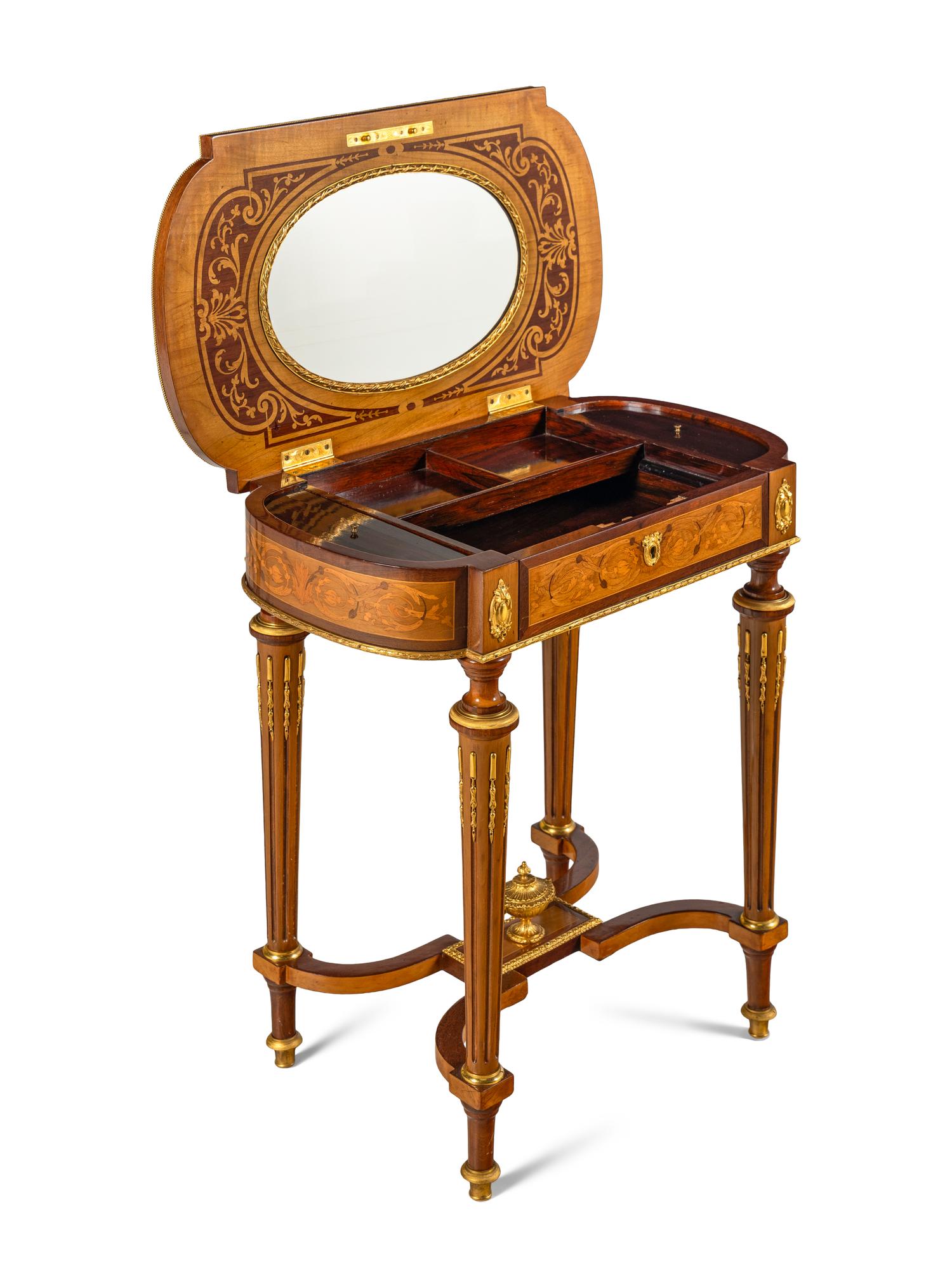 A Louis XVI Style Gilt Bronze Mounted Marquetry Dressing Table