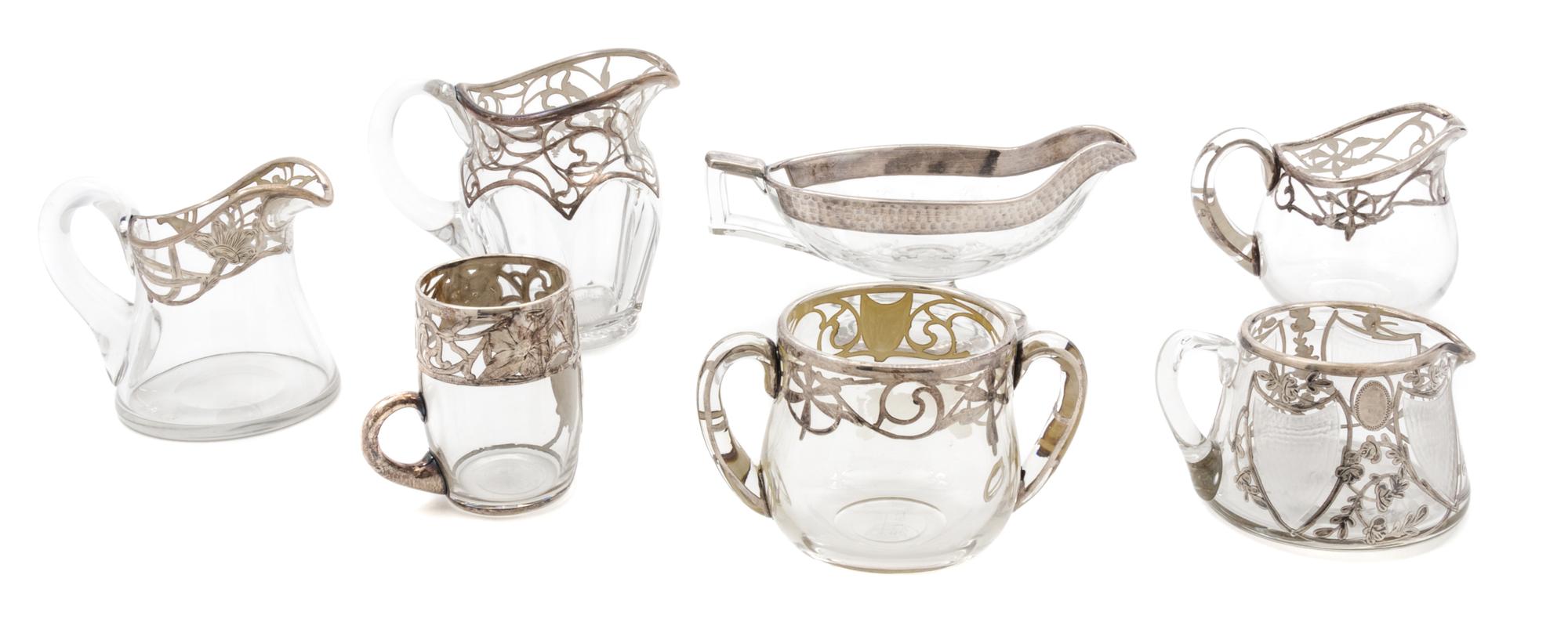 A Group of Seven Silver Overlay Glass Table Articles Height of tallest 4 1/2 inches.
