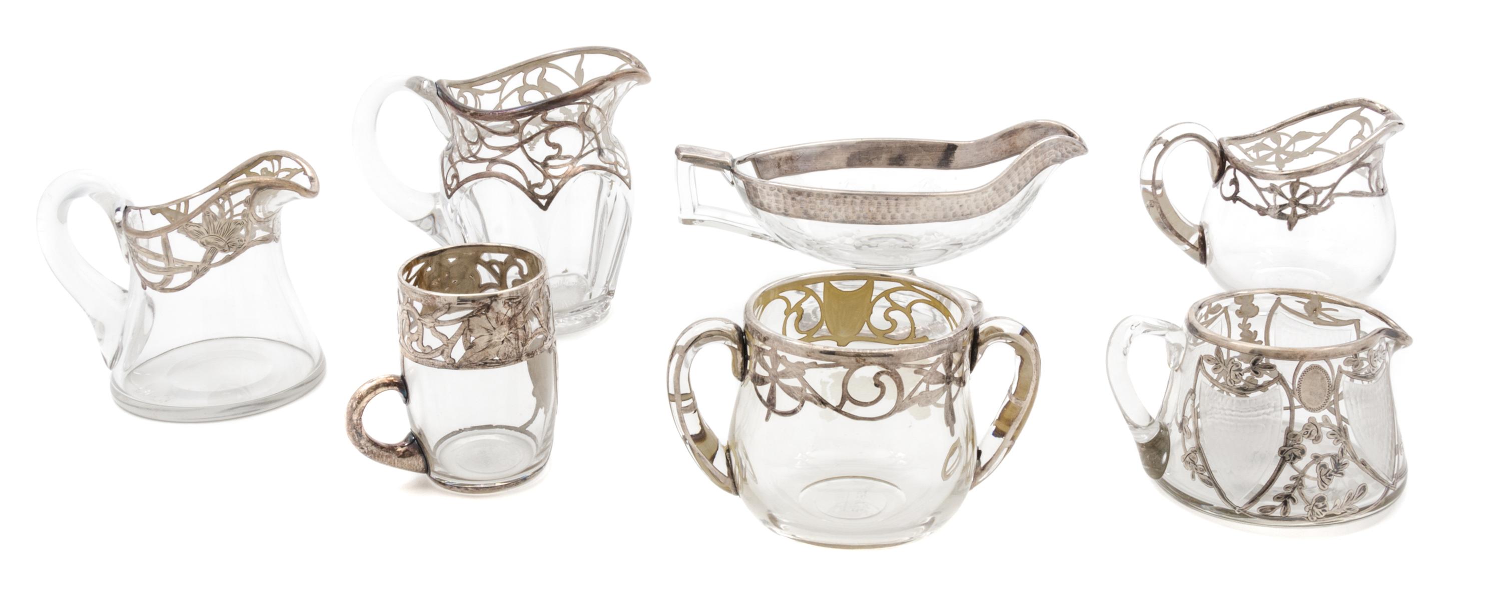A Group of Seven Silver Overlay Glass Table Articles Height of tallest 4 1/2 inches.