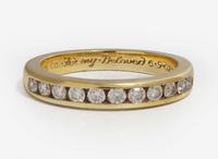 An 18K Yellow Gold and Diamond Band by Tiffany & Co.