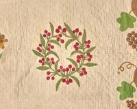 An Appliqued, Trapunto and Embroidered Quilt