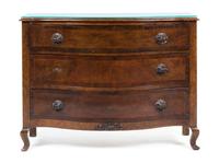A Continental Walnut Chest of Drawers Height 35 1/2 x width 48 x depth 19 1/2 inches.