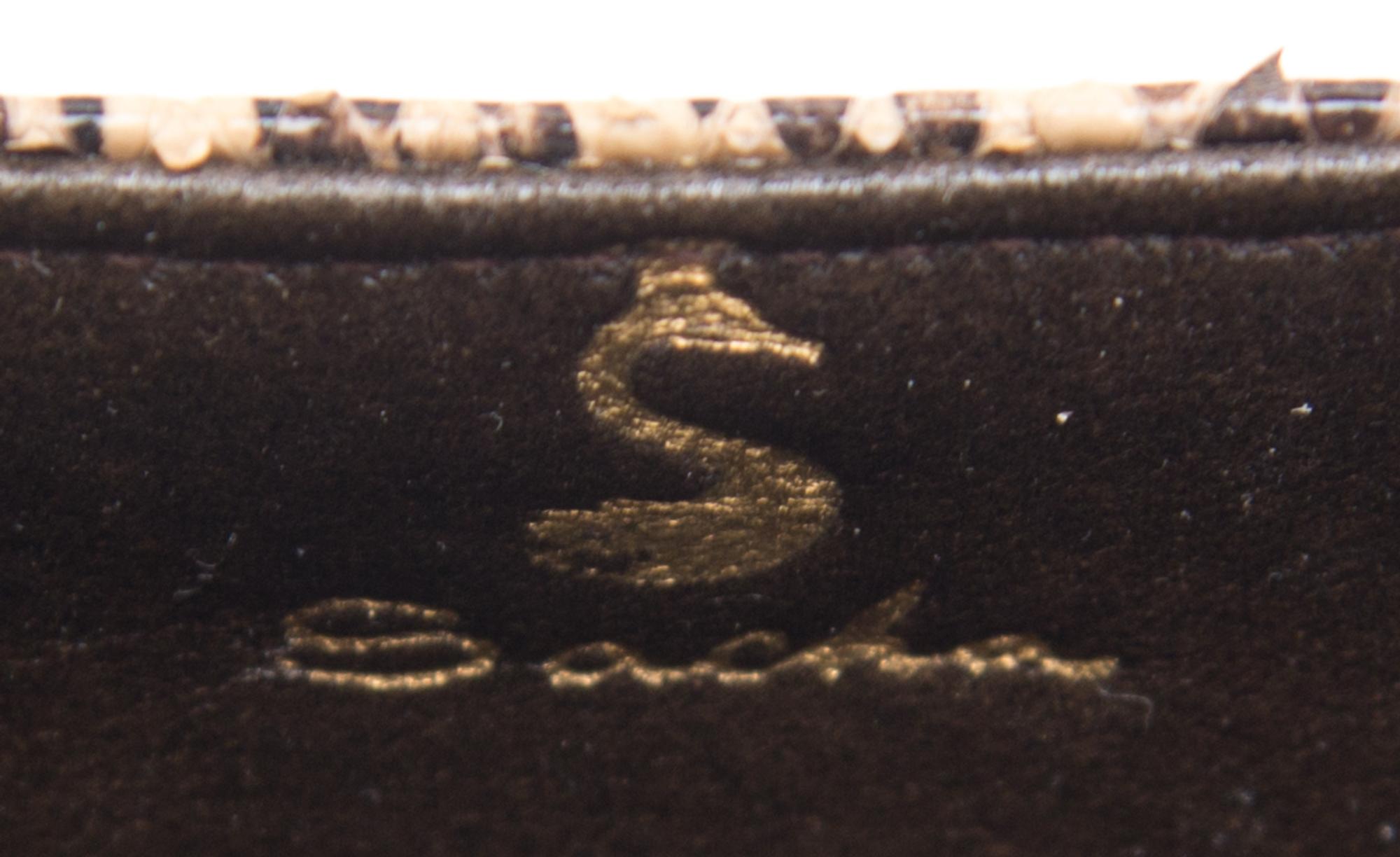 A Sacha Python Handbag, 6.5" x 5" x 3.5".