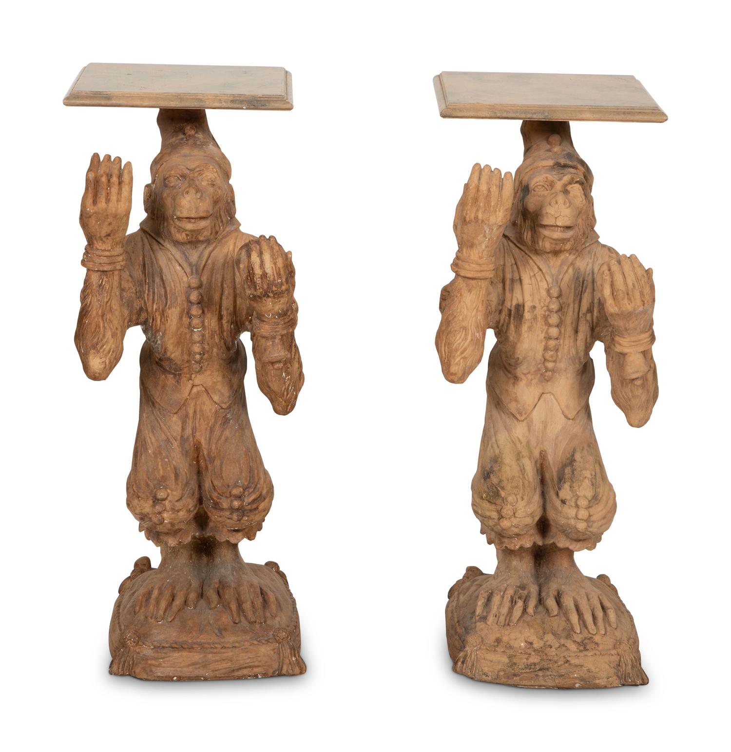 A Pair of Terra Cotta Monkey Pedestals