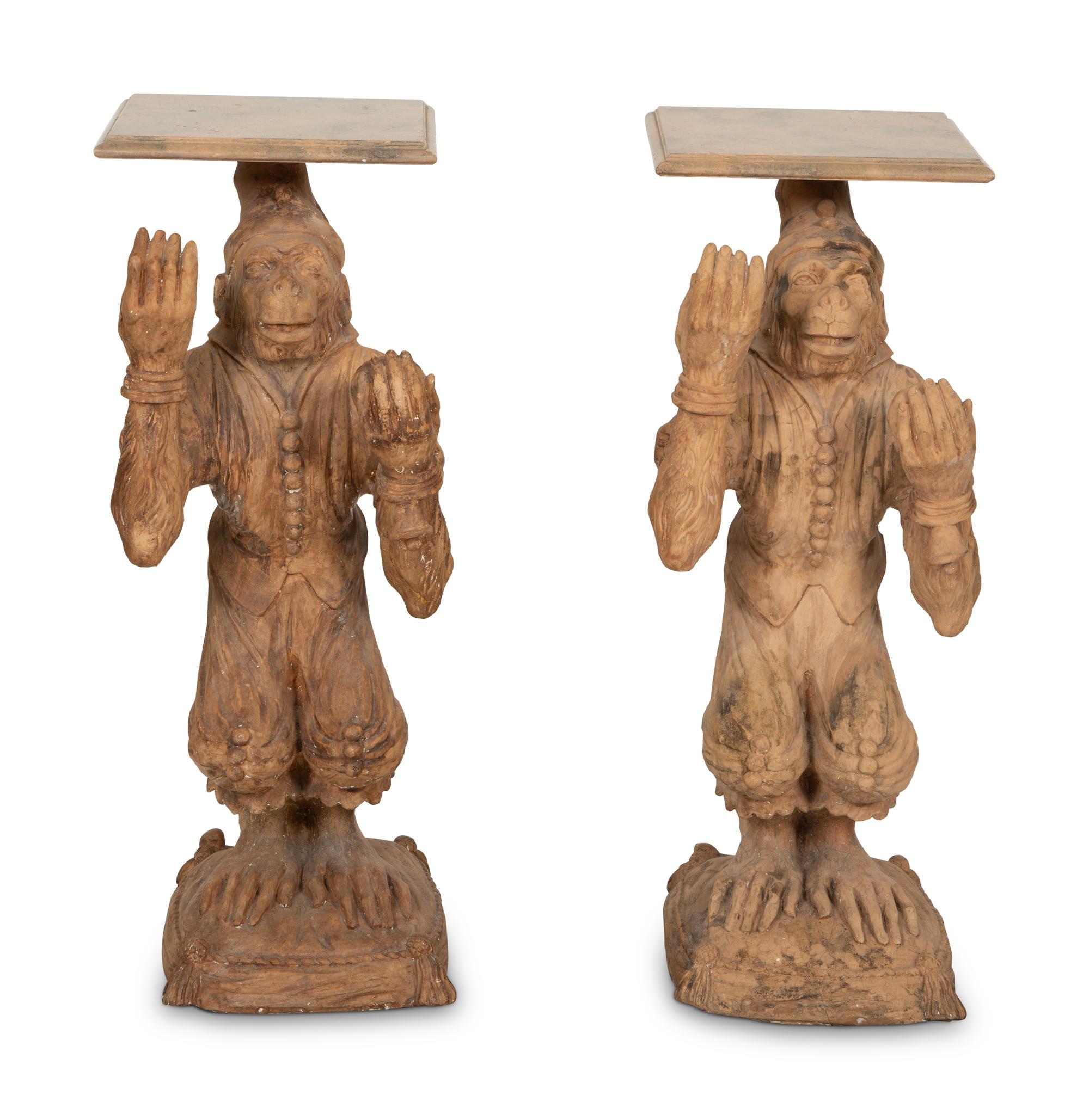 A Pair of Terra Cotta Monkey Pedestals