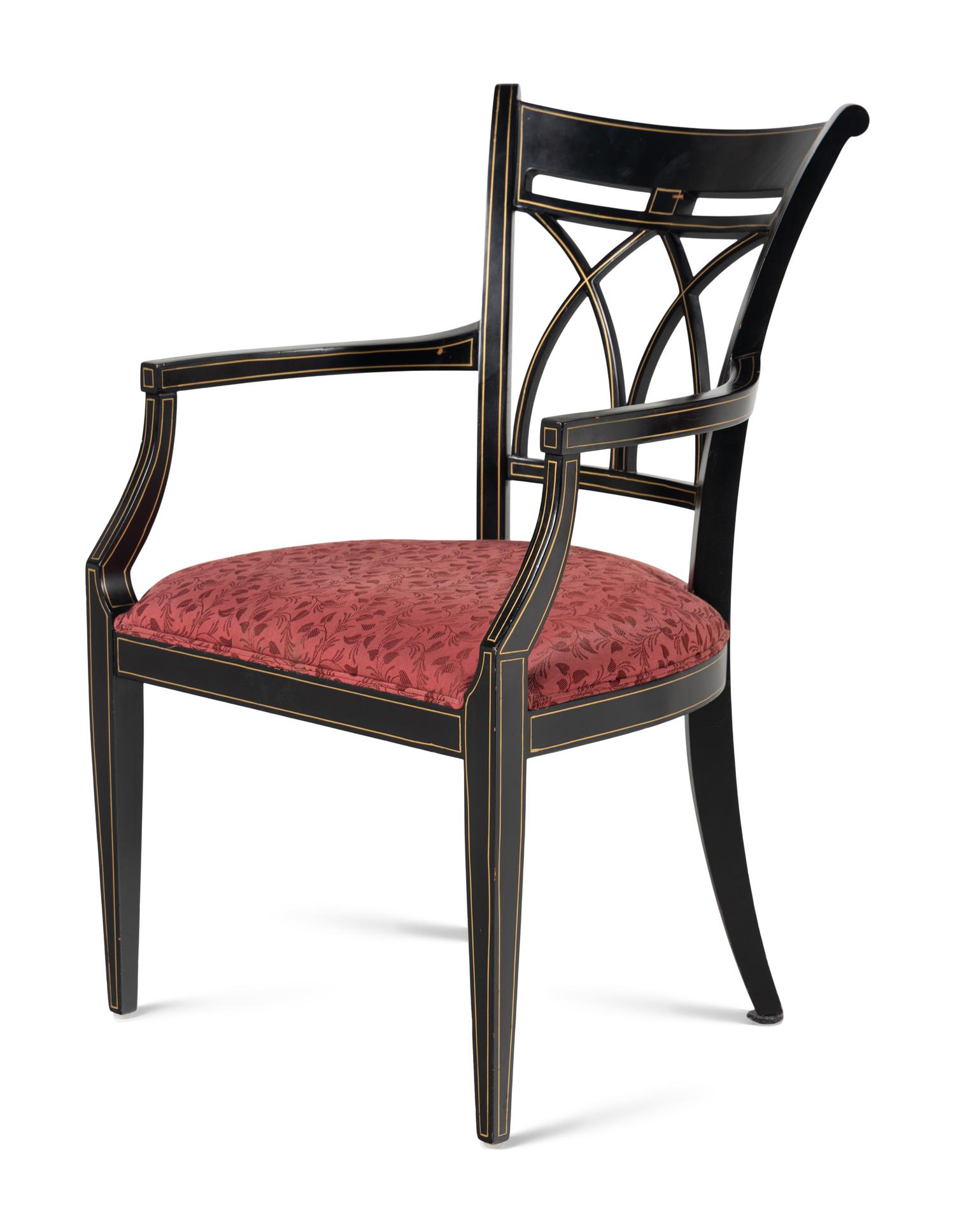 A Pair of Regency Style Ebonized and Parcel-Gilt Armchairs
