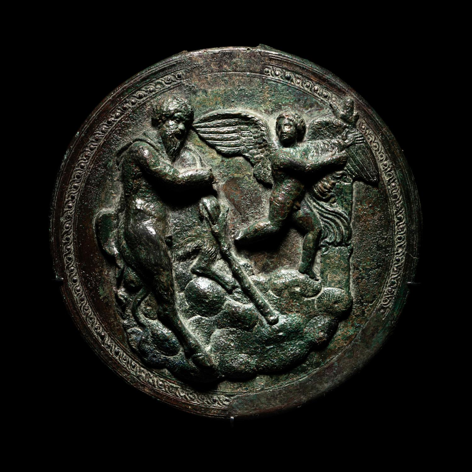 A Greek Bronze Box Mirror with Pan and Eros