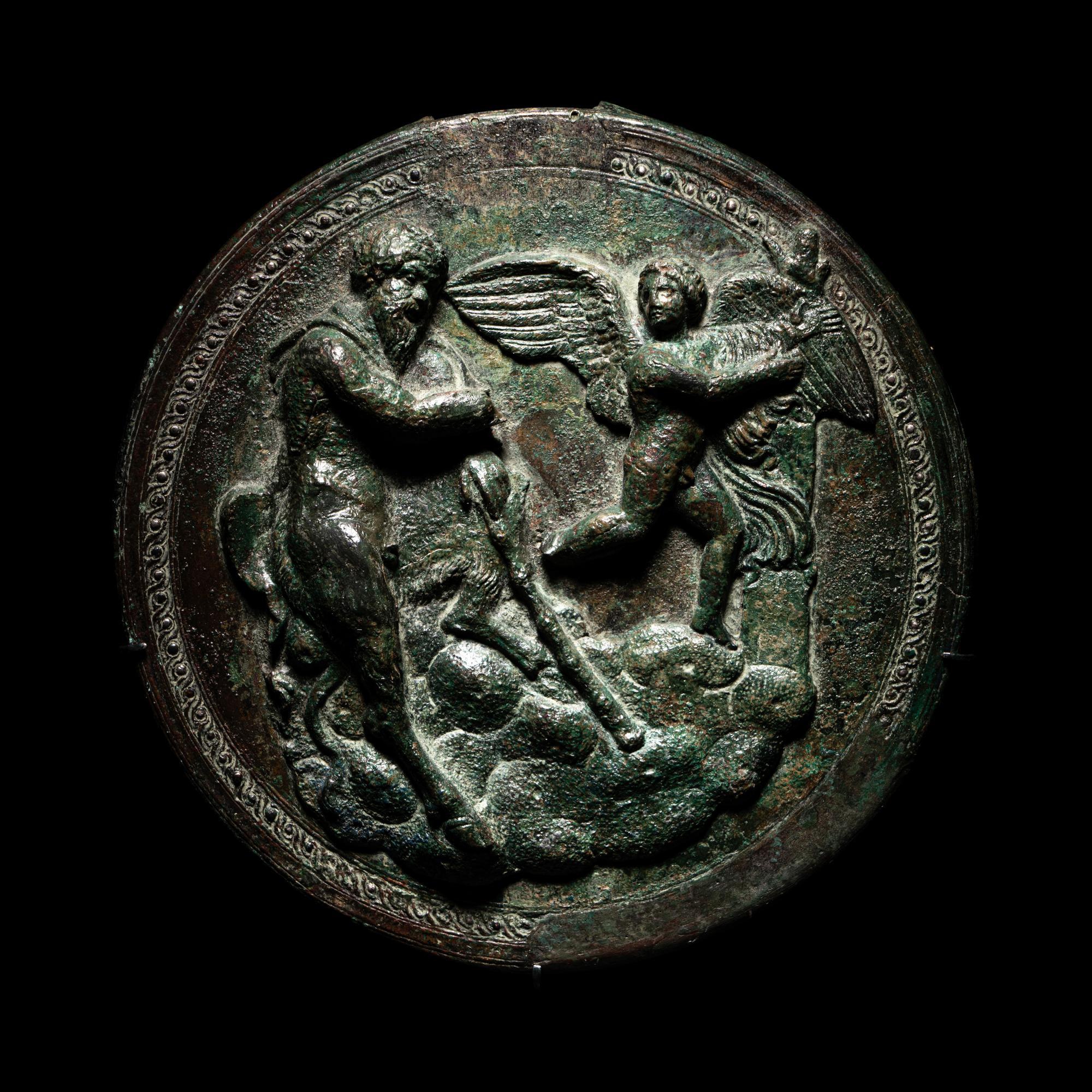 A Greek Bronze Box Mirror with Pan and Eros