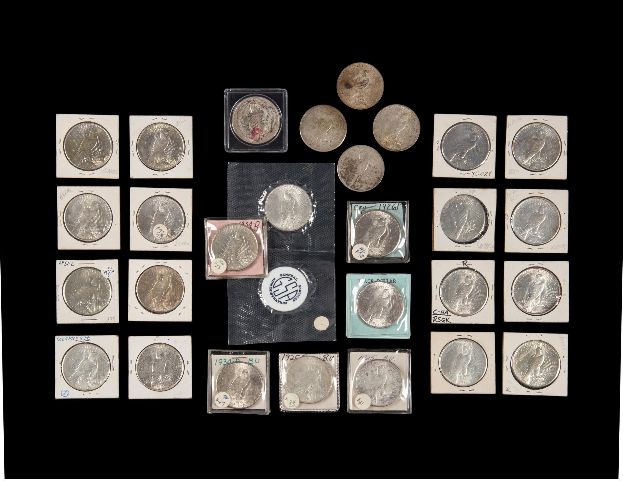 A Group of Twenty-Eight Peace $1 Coins