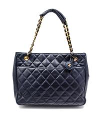 A Chanel Navy Quilted Leather Tote Handbag, 12" x 8" x 2"; Strap drop: 7".