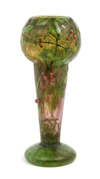 Daum, EARLY 20TH CENTURY, enameled and applied cameo glass vase, of baluster form decorated with berry laden leafy branches,