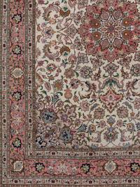 A Tabriz Wool Rug