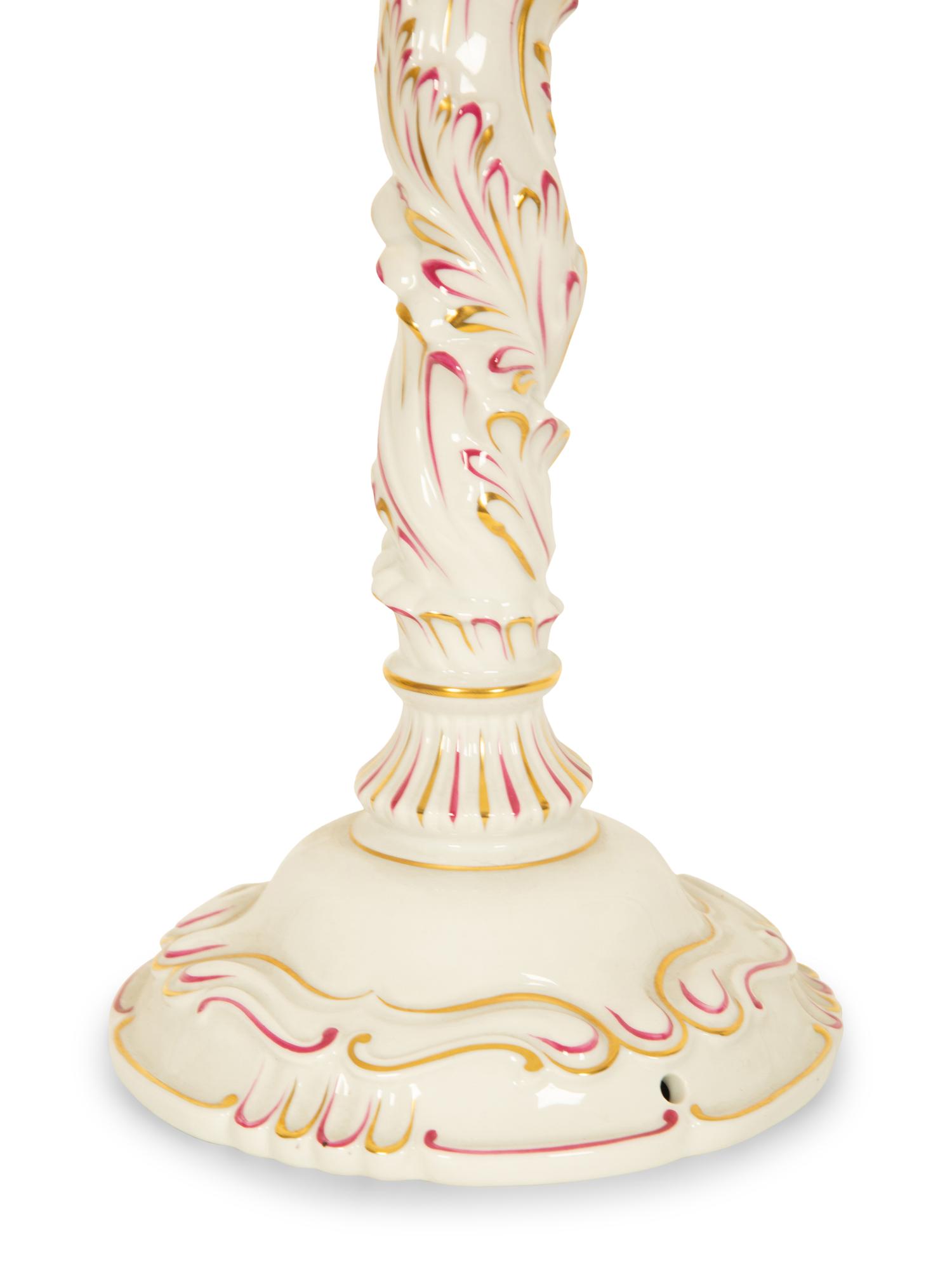 A Pair of Herend Porcelain Three-Light Candelabra and a Pair of Matching Candlesticks