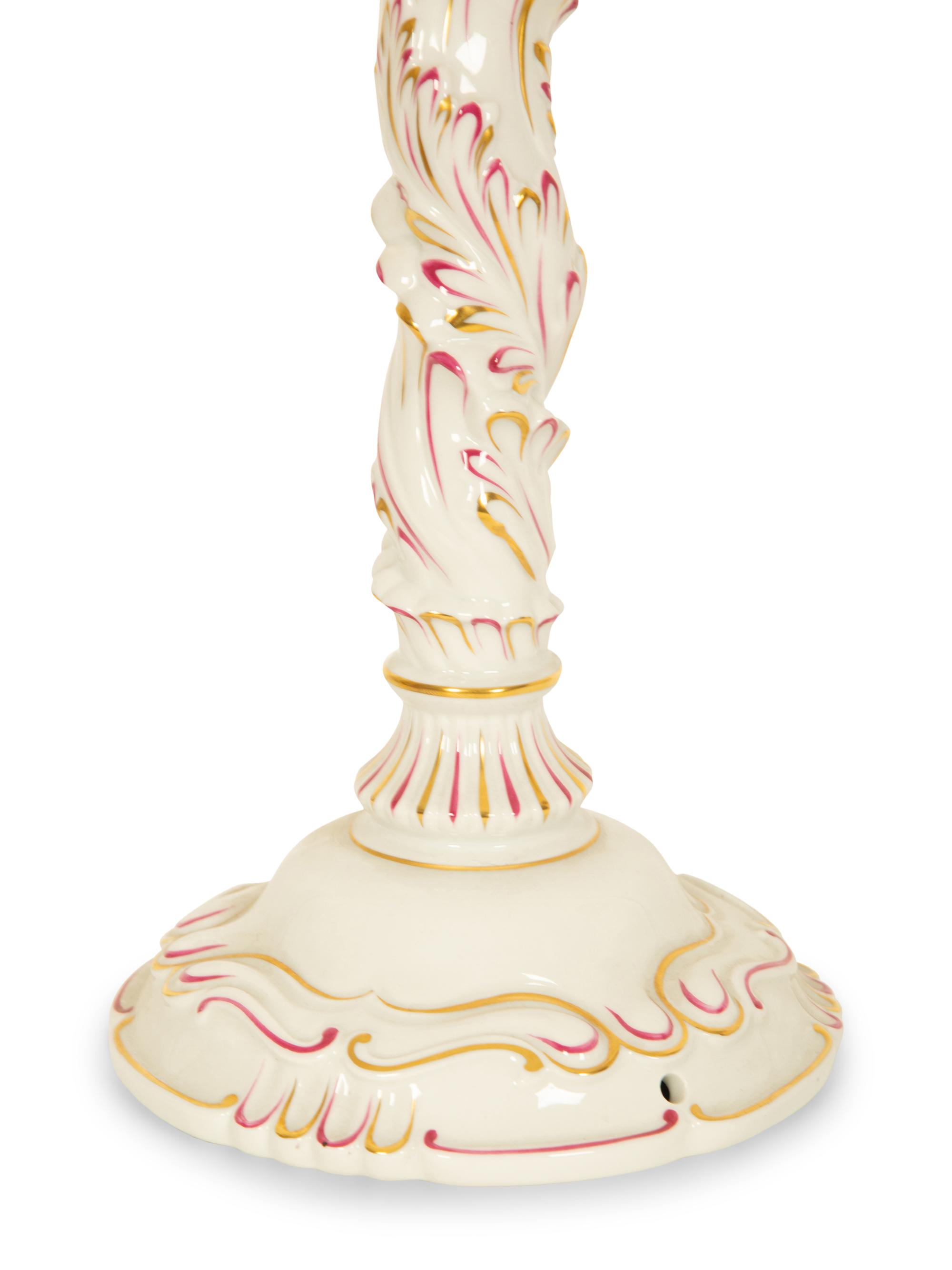 A Pair of Herend Porcelain Three-Light Candelabra and a Pair of Matching Candlesticks
