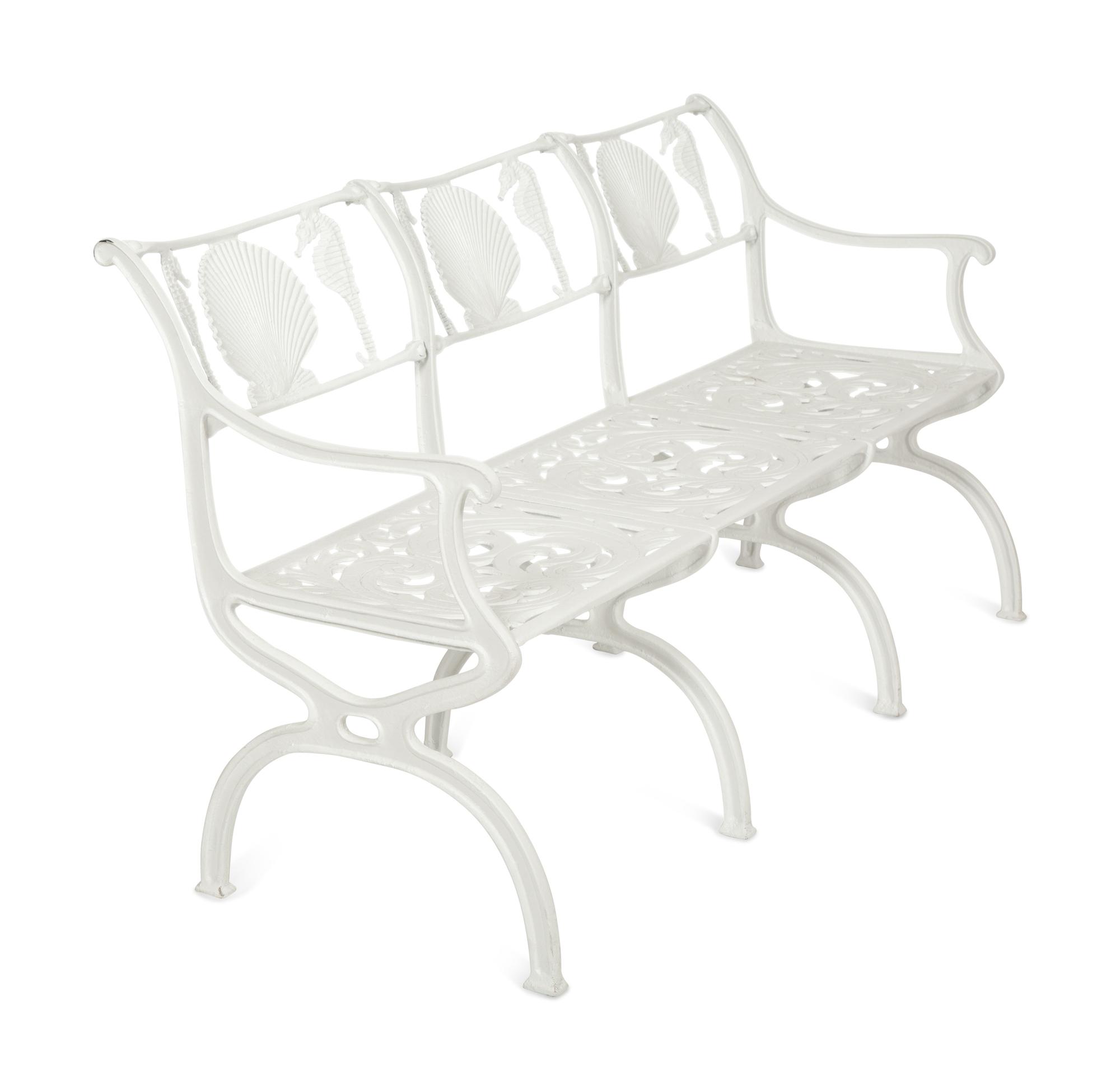 A Suite of White-Painted Cast Metal Garden Furniture