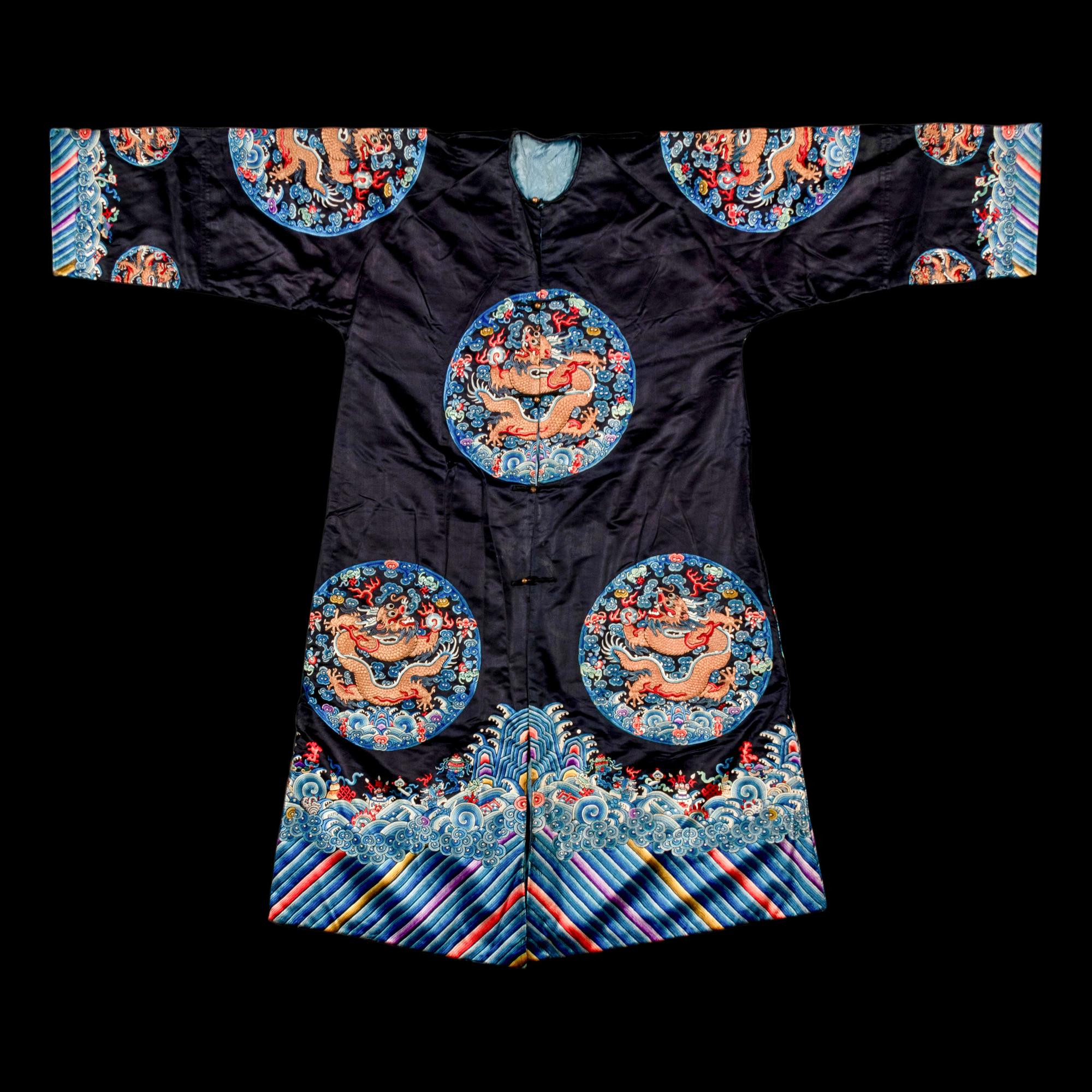 A Chinese Dark Navy Ground Embroidered Silk 'Dragon' Robe, 19th Century 清晚期 石青緞繡八團五爪龍褂