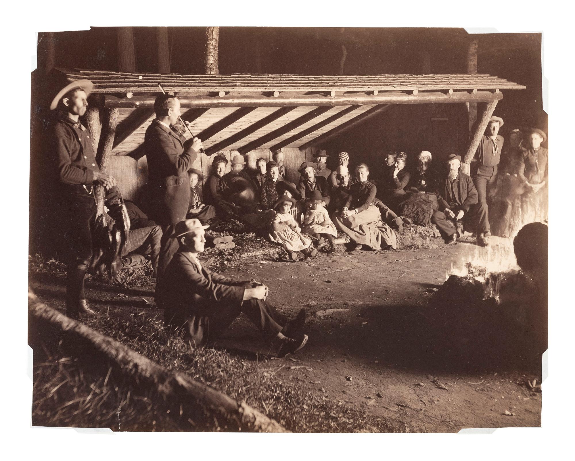 New York STODDARD, Seneca Ray (1844-1917), photographer, attrib. Photograph of a campfire scene.