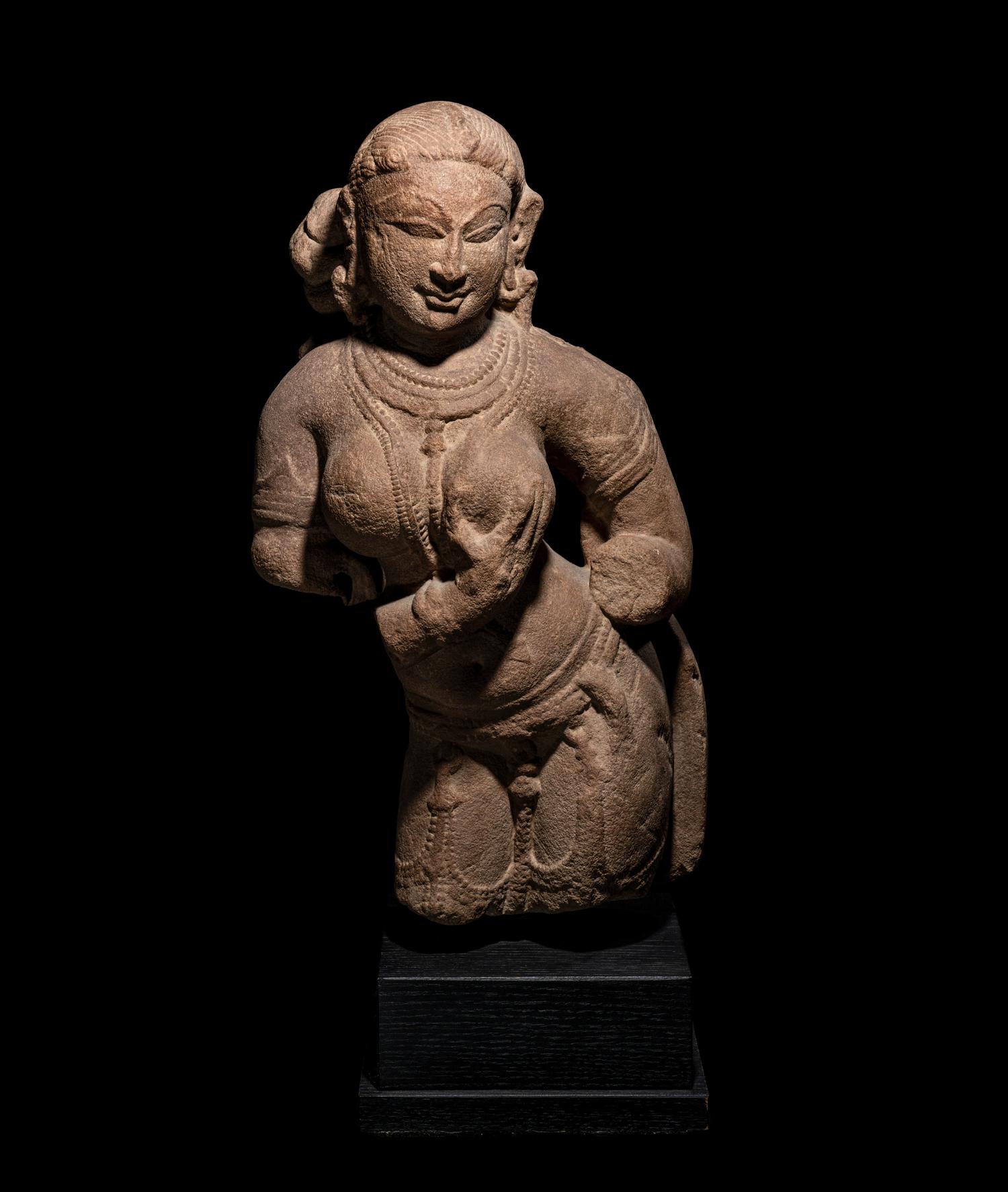 An Indian Red Sandstone Figure of a Female Deity