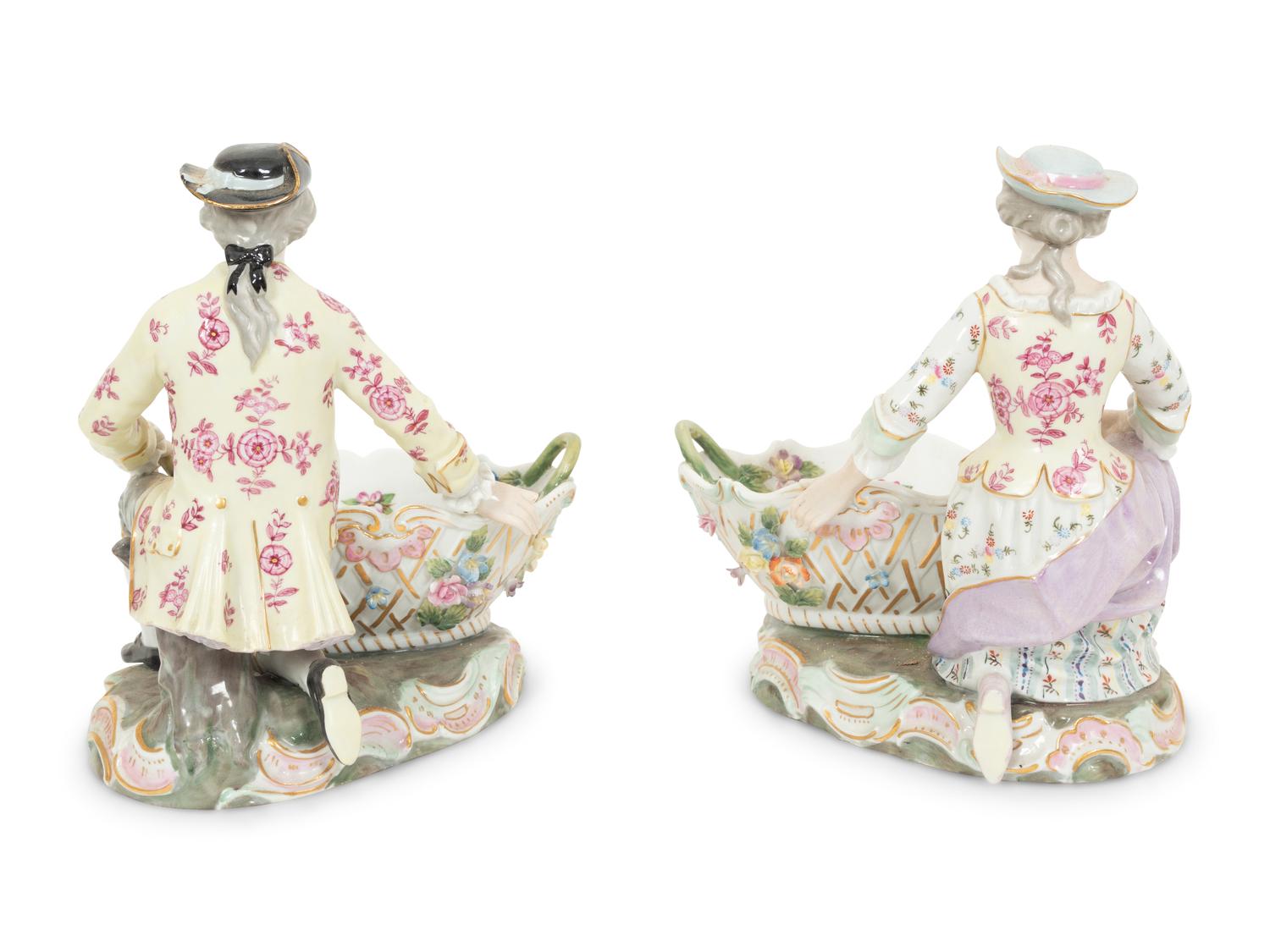 A Pair of Dresden Porcelain Figural Sweetmeat Dishes
