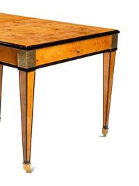 A Biedermeier Style Part-Ebonized Burlwood Dining Table