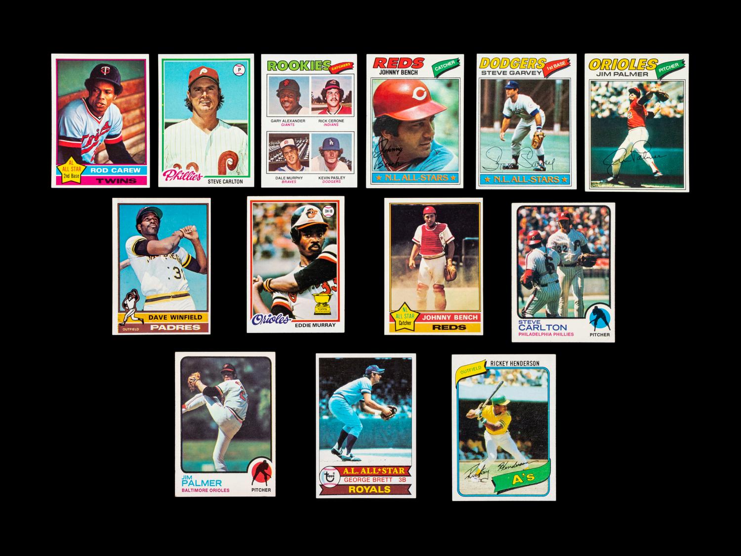A Group of 13 Topps Hall of Fame and Star Baseball Cards Including Rickey Henderson and Eddie Murray Rookies,