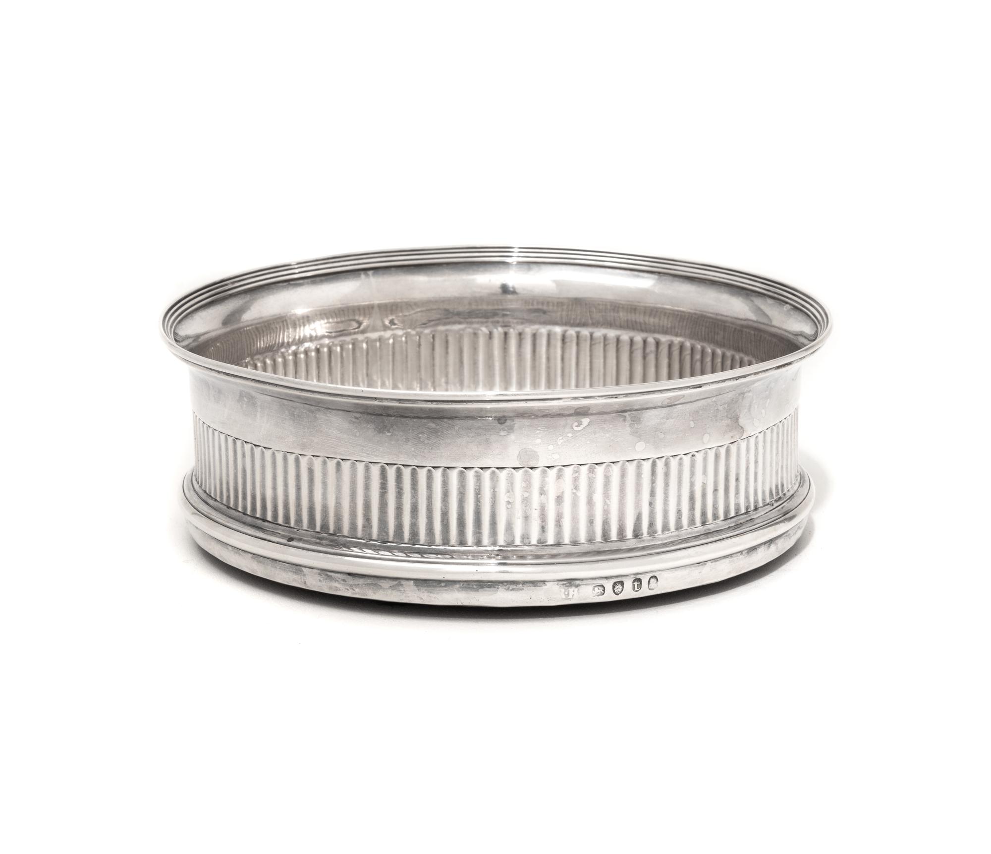 A George III Silver Wine Bottle Coaster