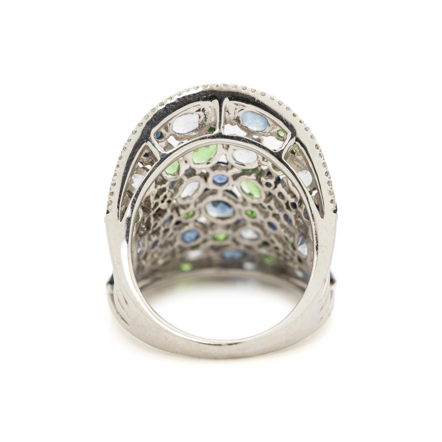 TSAVORITE GARNET, SAPPHIRE AND DIAMOND RING