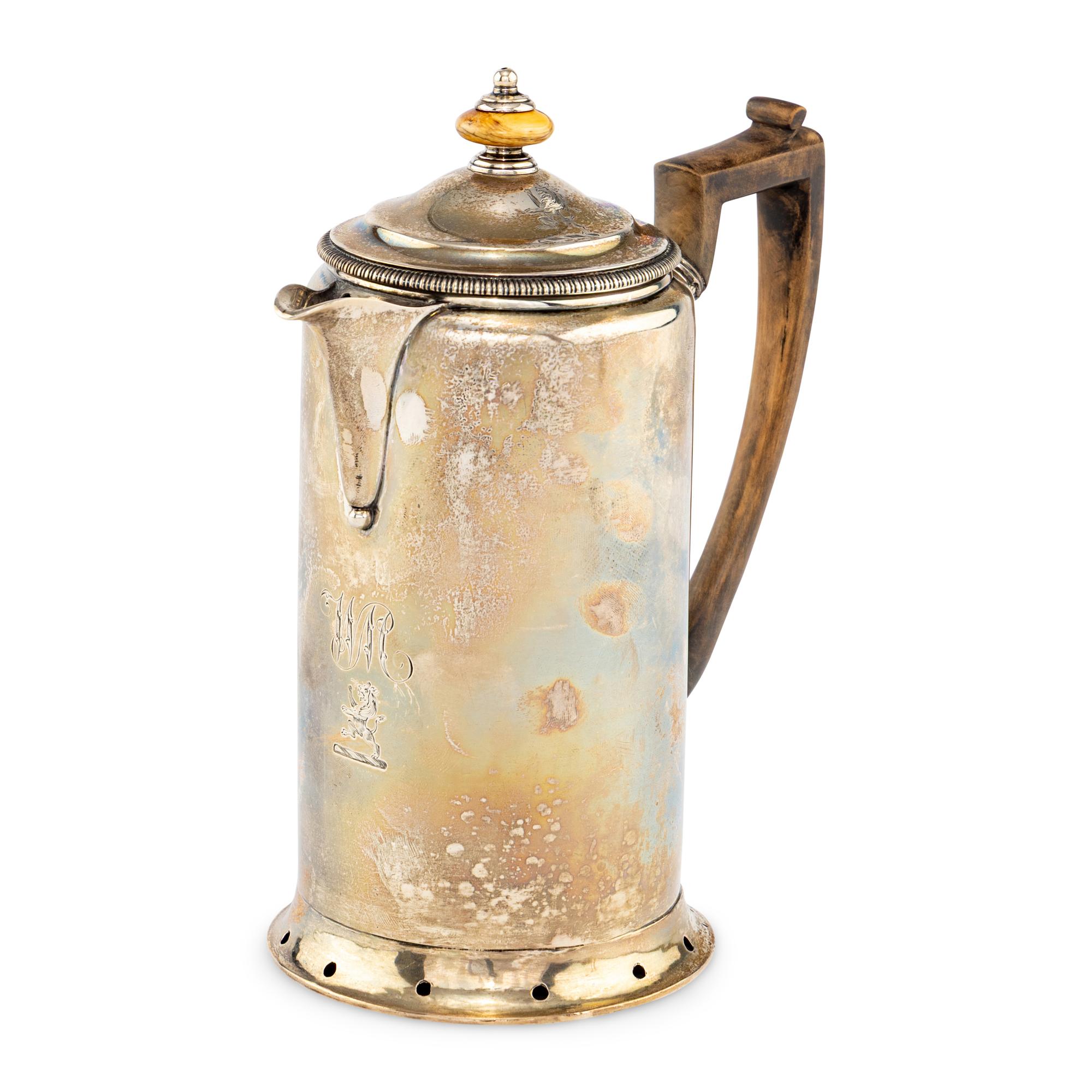 A George III Silver Hot Water Pot