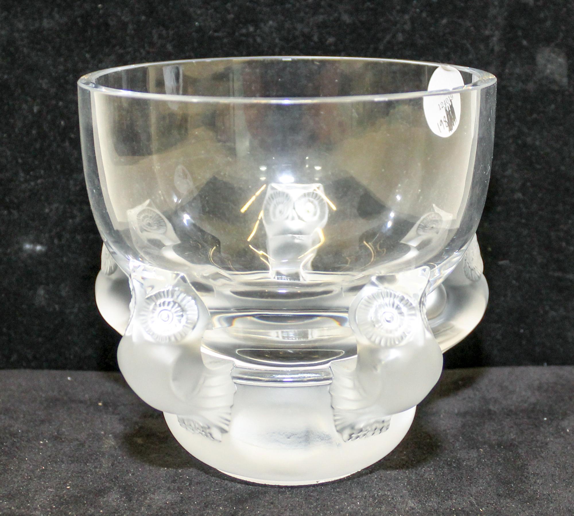 A Lalique Molded and Frosted Glass Vase. Height 5 1/2 inches.