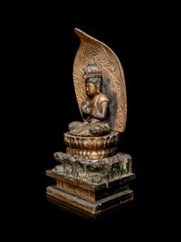 A Gilt Lacquered Wood Figure of Seated Kannan